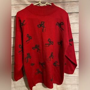Cute women’s bow sweater. Red with black bows.  M